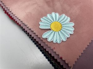 Strygemærke - lyseblå blomst